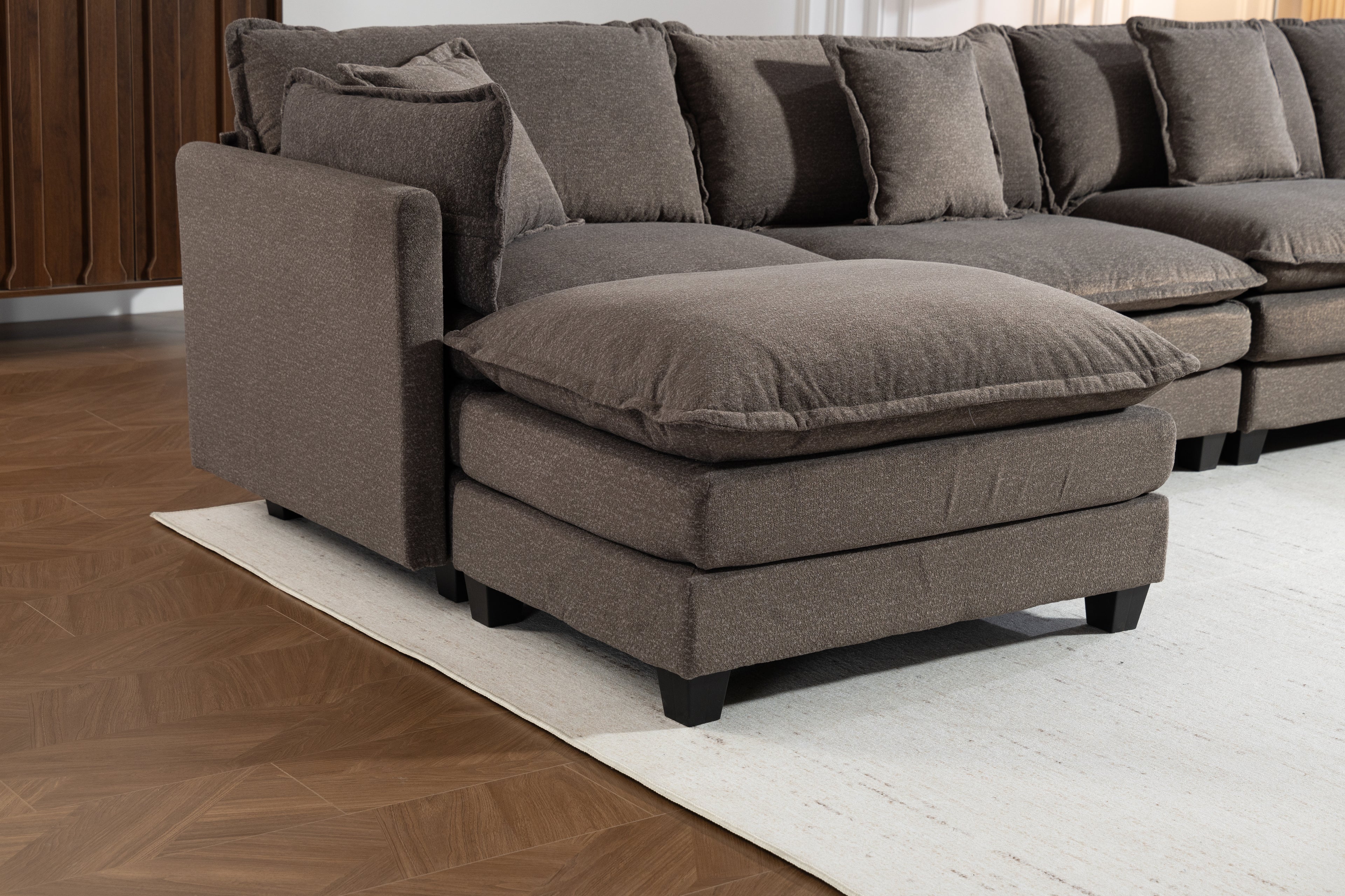 Modern Four‑Seat Sectional with Ottomans