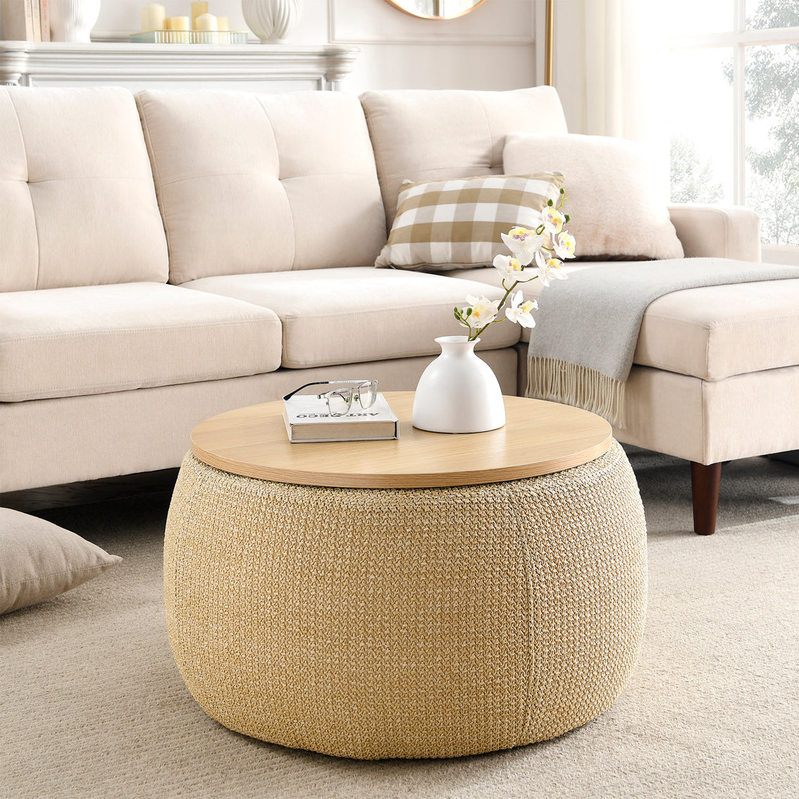 Beige ottoman with a wooden top in a living room setting