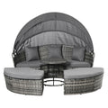 4-piece round rattan daybed set with canopy in modern outdoor patio