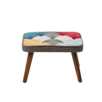 Stool with a colorful patchwork seat on a white background