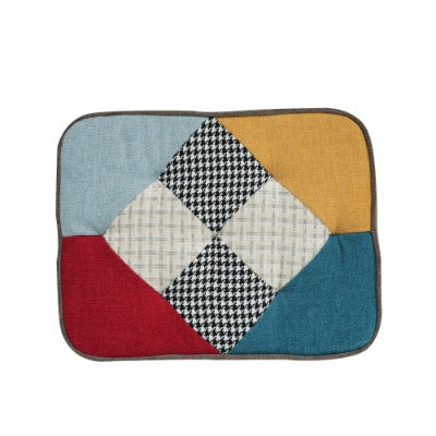 Colorful rocking lounge chair with foam cushioning and wooden frame