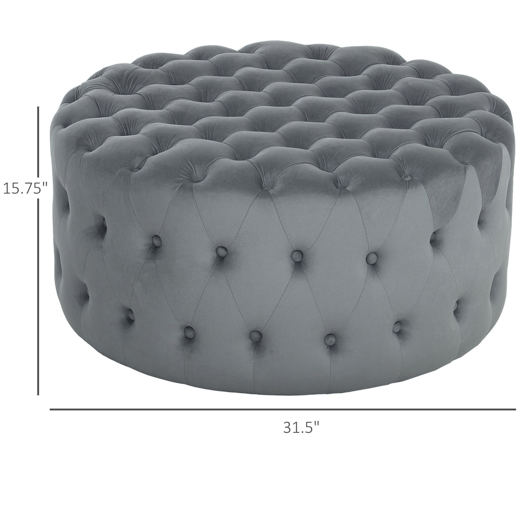 Gray tufted ottoman with dimensions on a white background