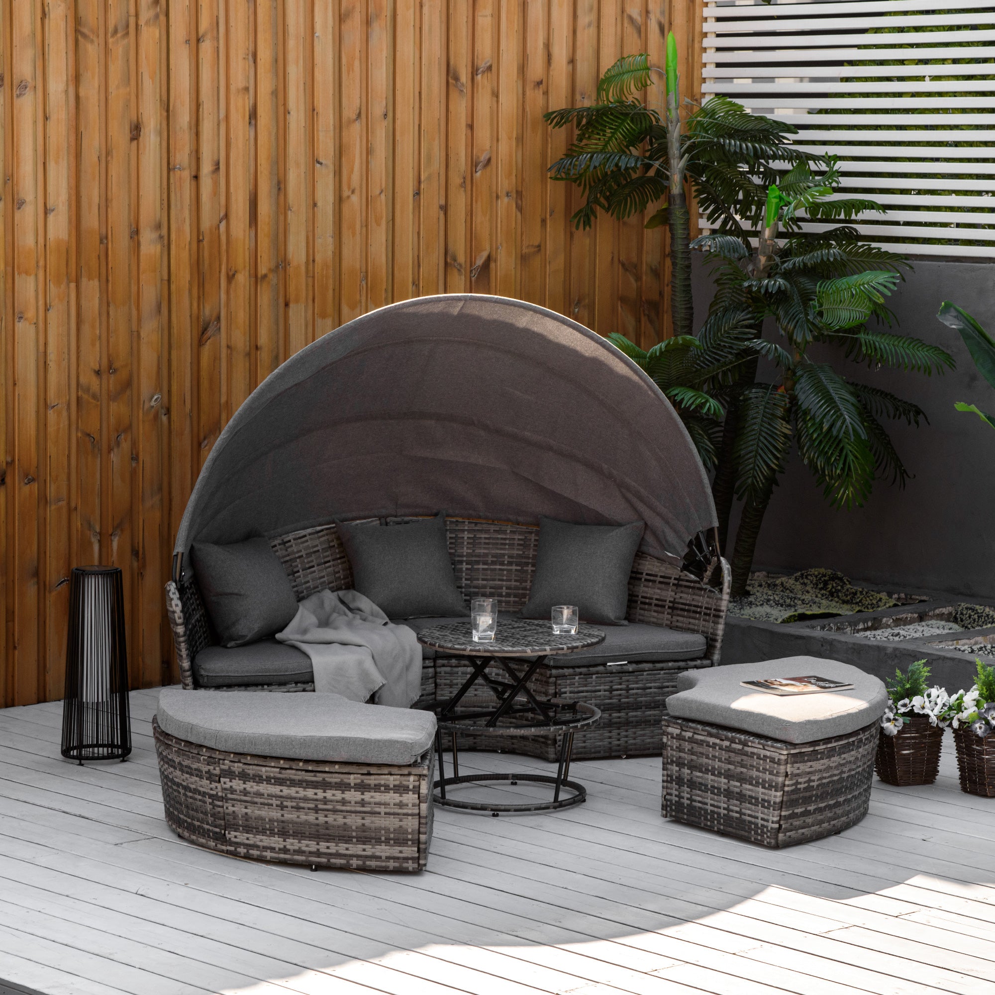 Convertible outdoor rattan sofa set with cushions and adjustable sunshade canopy