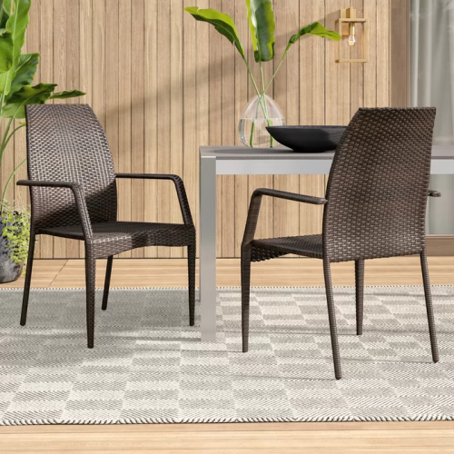 Outdoor wicker chairs set of 2 on modern patio with brown resin finish