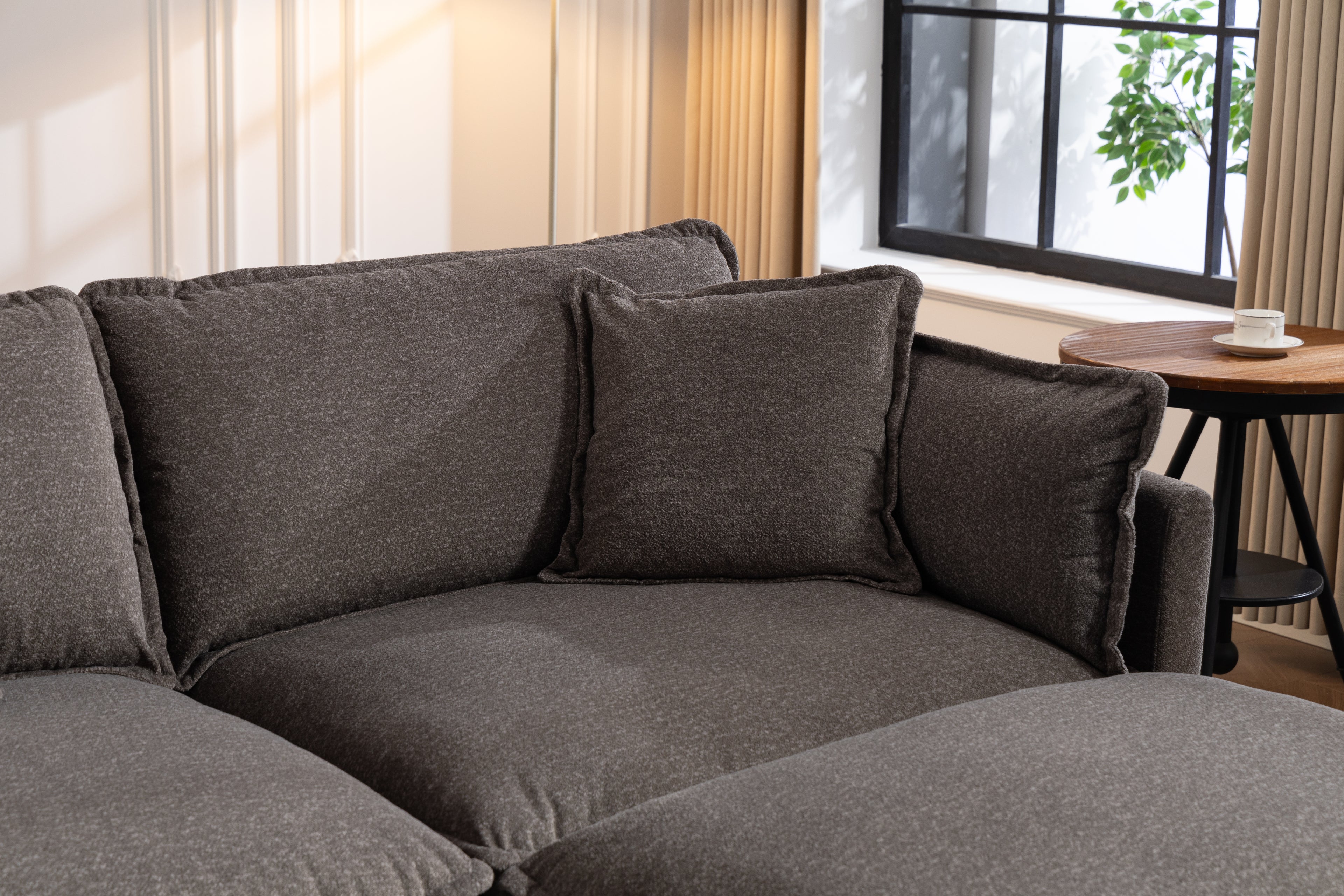 Modern Four‑Seat Sectional with Ottomans