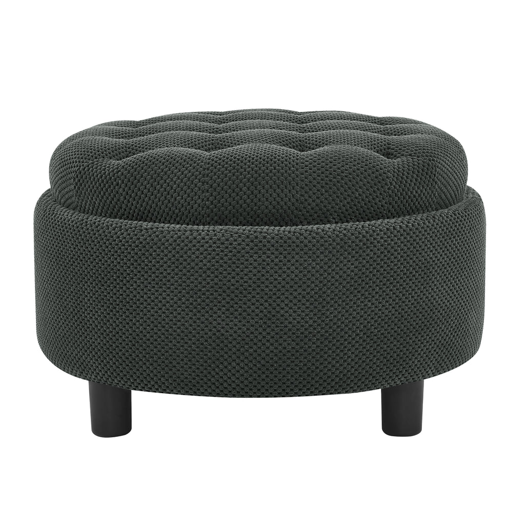 Round tufted ottoman with black legs on a white background